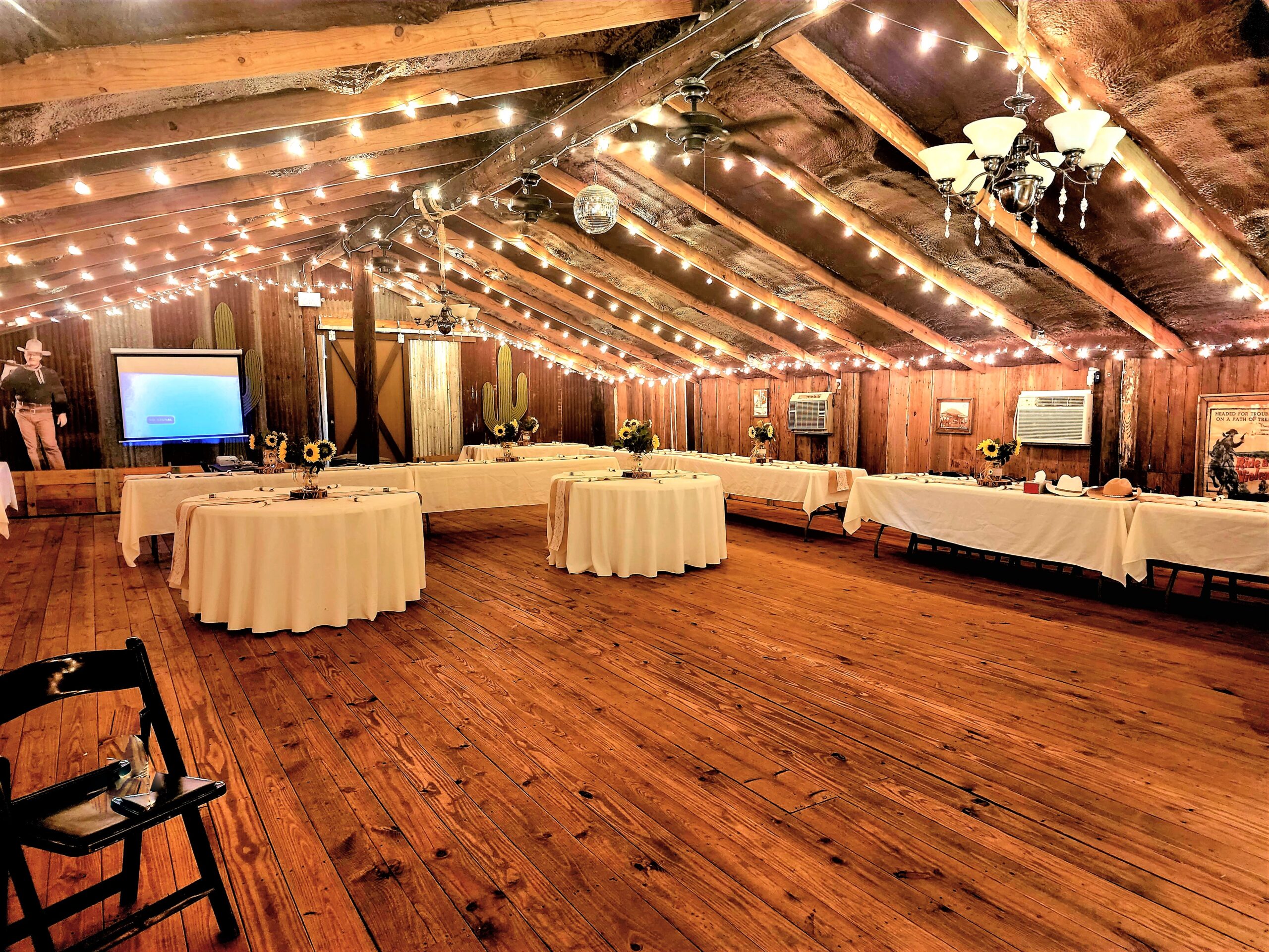 Wide exterior view of the barn at Chisholm Trail Rustic Venue