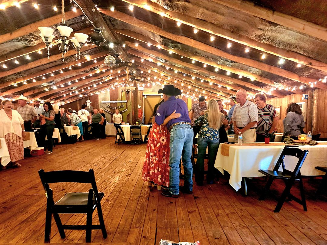 Birthday party setup inside the rustic barn