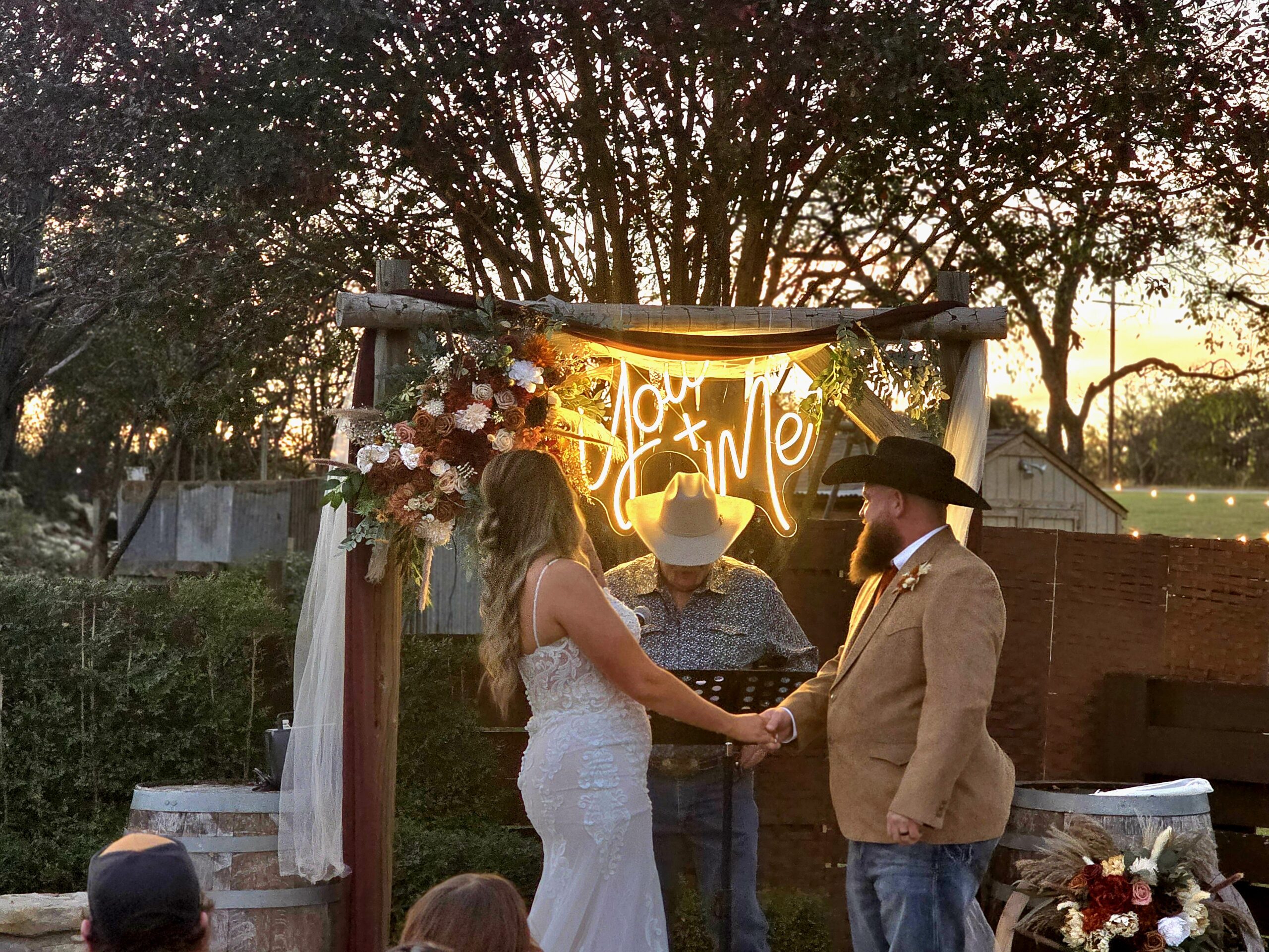 Outdoor wedding ceremony at Chisholm Trail Rustic Venue in Cleburne, Texas